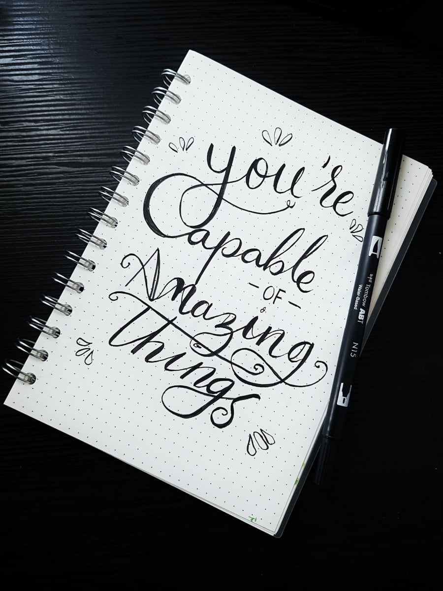 pen on you're capable of amazing things spiral notebook