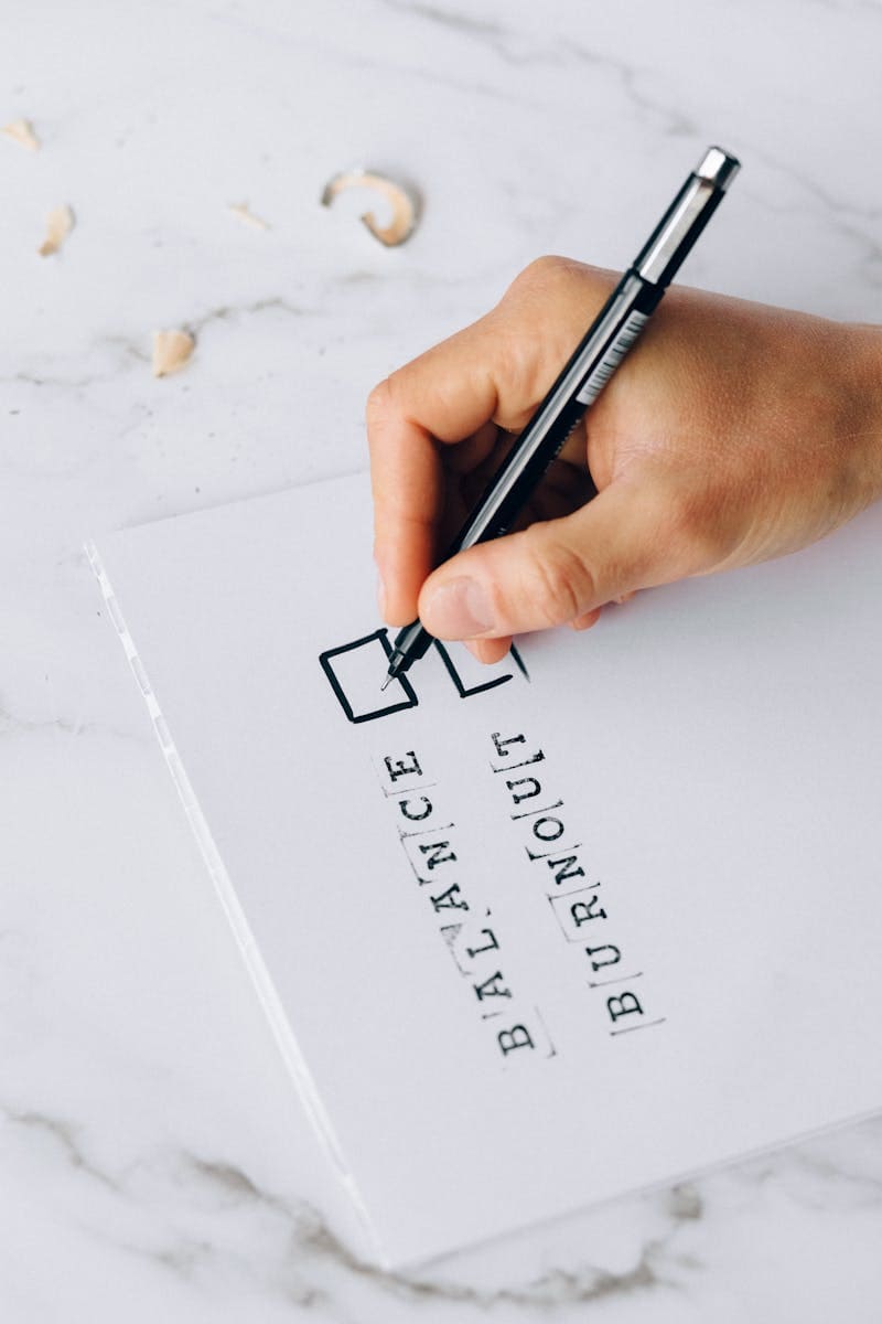 Close-up Photo of Checklist on White Paper